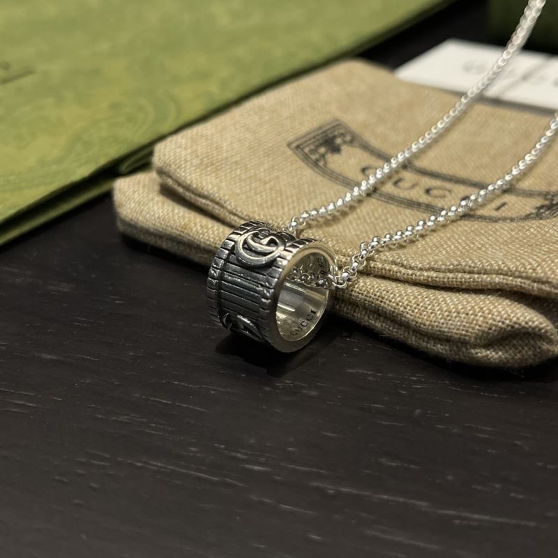 G*u*i necklaces
